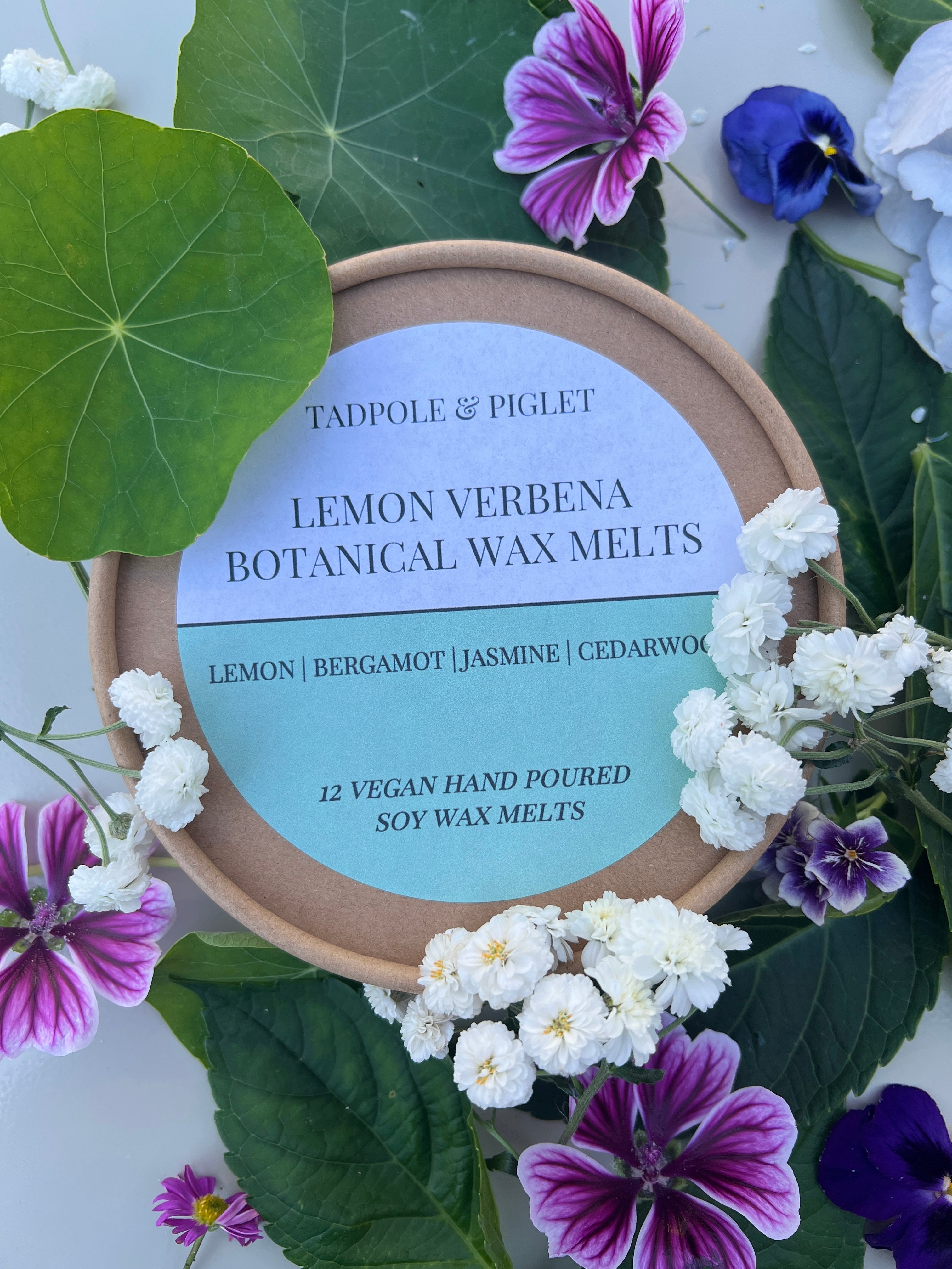 Lemon Verbena Botanical Wax Melts packaging with floral accents, featuring vegan soy wax melts by Tadpole &amp; Piglet.