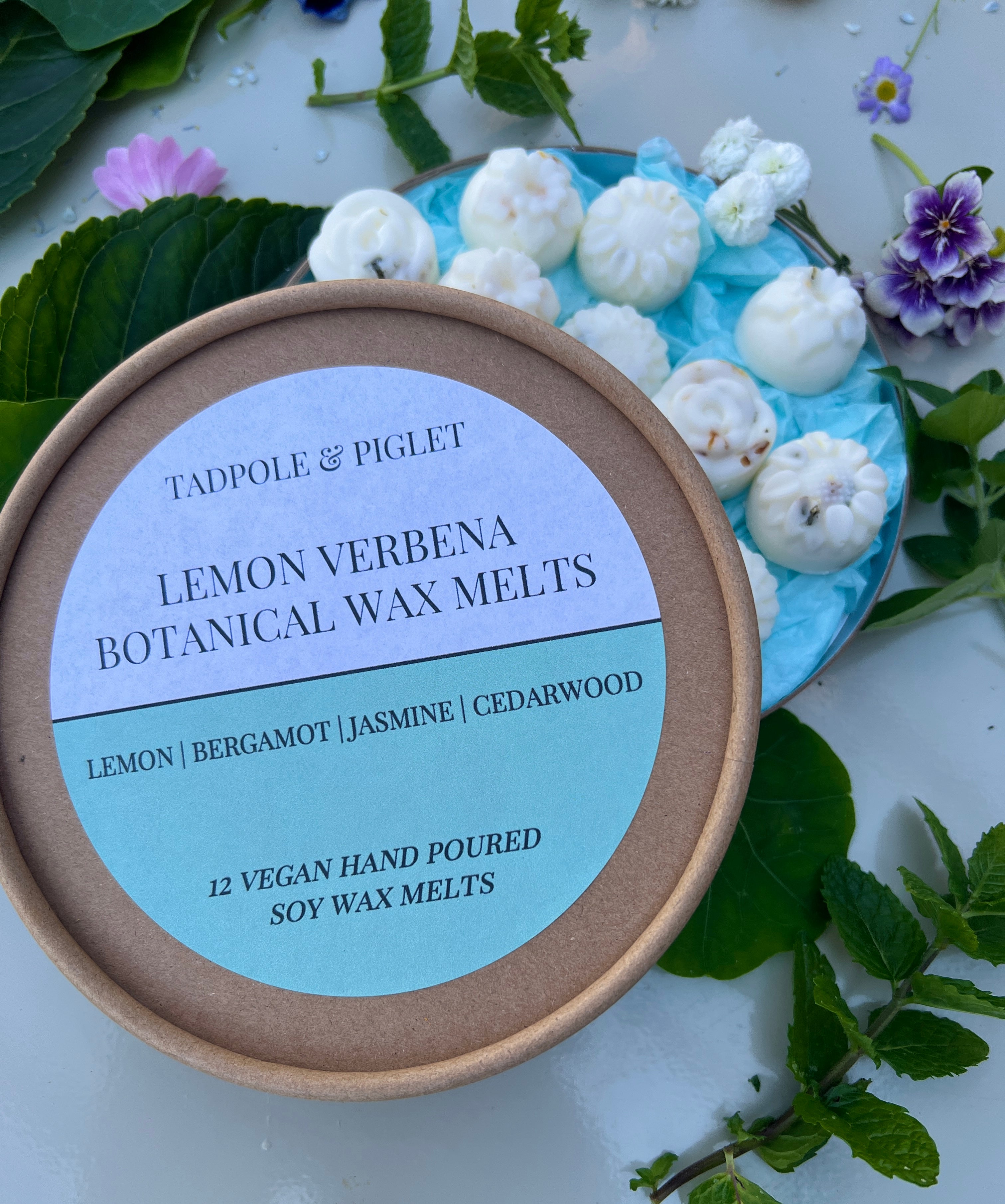 Lemon Verbena Botanical Wax Melts by Tadpole &amp; Piglet, featuring 12 hand-poured soy melts with floral accents.