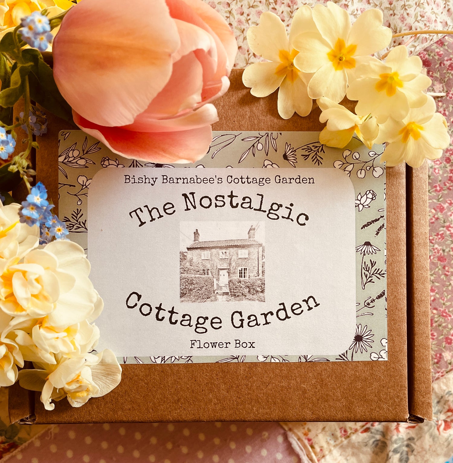 The Nostalgic Cottage Garden Flower Box with a floral arrangement and vintage-style packaging